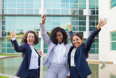 happy-excited-businesswomen-rejoicing-corporate-success